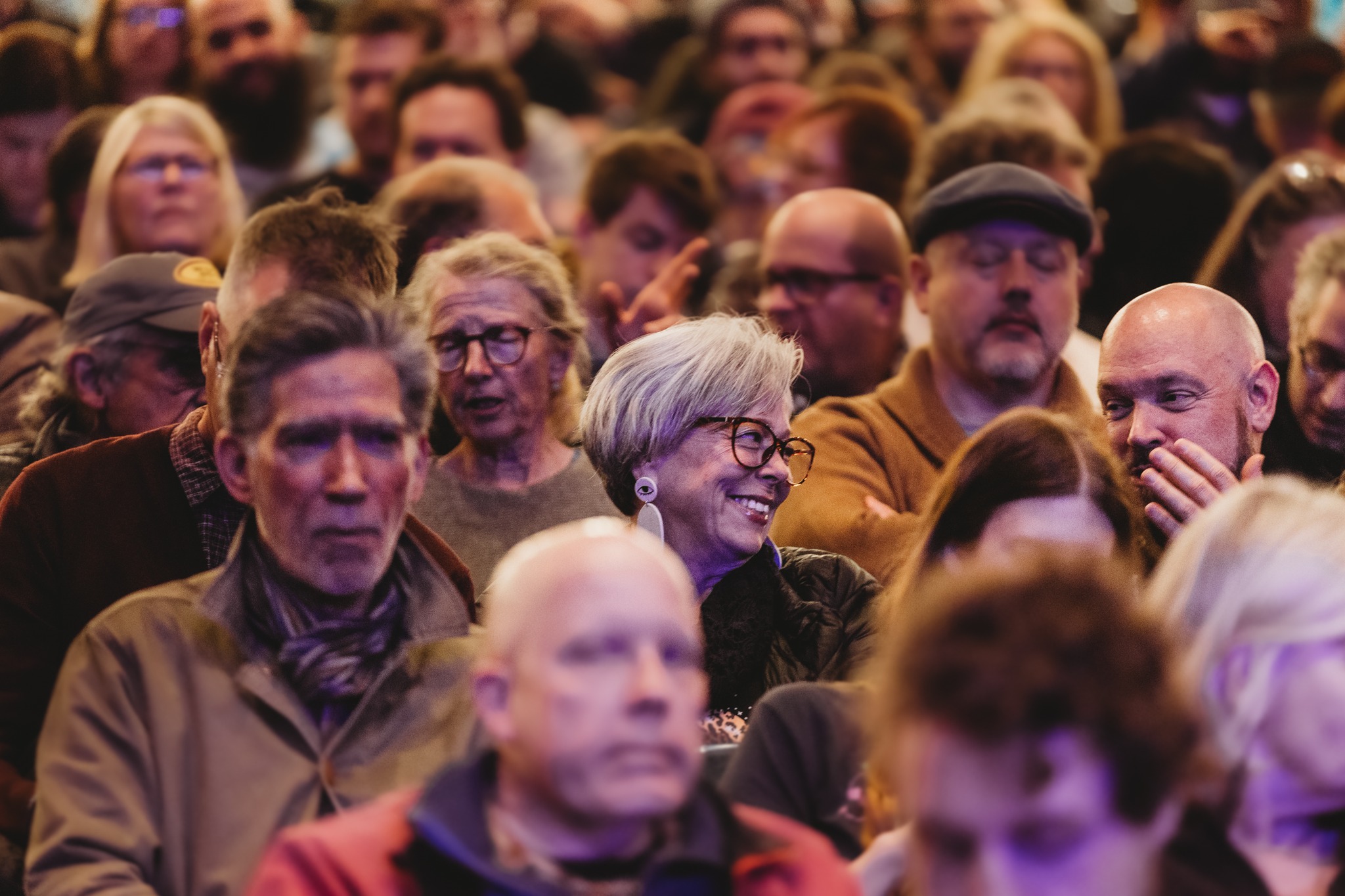 A Thanksgiving theater crowd: Families and friends lined up outside a cinema