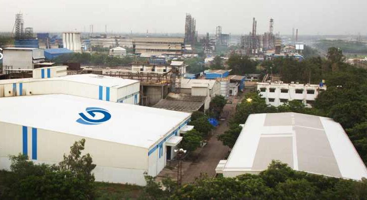 A modern ethanol production facility in Assam utilizing bamboo as a raw material, highlighting innovation in biofuel technology